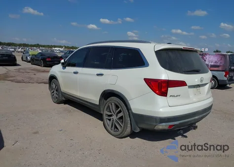 2016 Honda Pilot Touring z USA, uszkodzony, nr VIN 5FNYF5H93GB030459